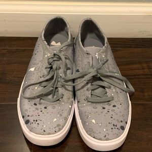 Gray under armor sneakers.